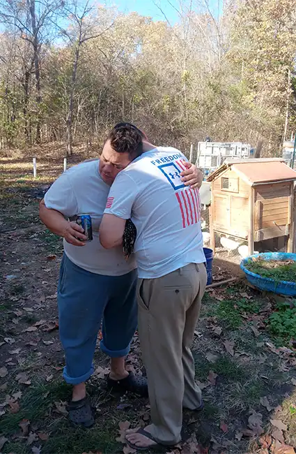 David Haave and brother sharing Gods love on the farm of Little Dannys Books